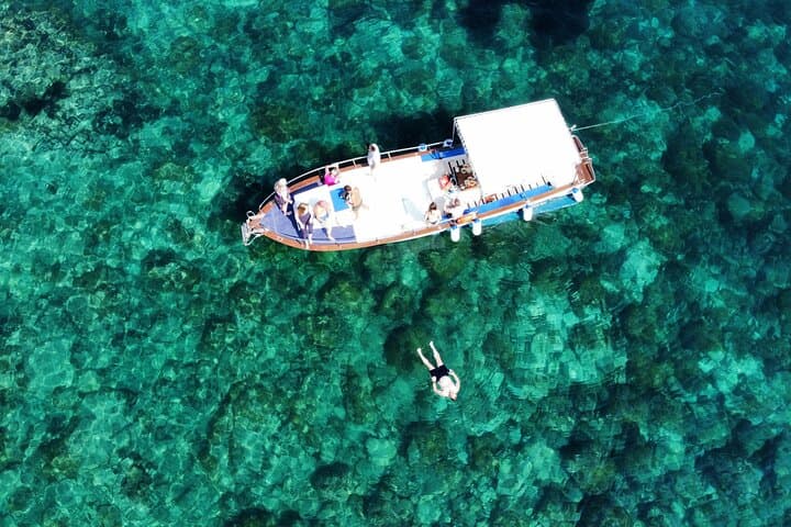Taormina Coast Boat Tour with Aperitif and Snorkeling
