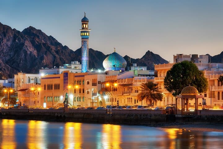 Golden-Hour Cruise Past Old Muscat: Sunset, Forts & Mutrah Views