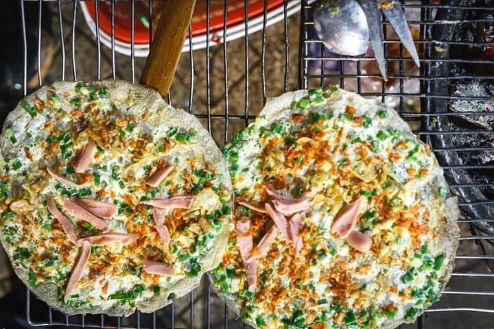 Saigon After Dark: Scooter Street-Food Tour with a Local Student photo 3