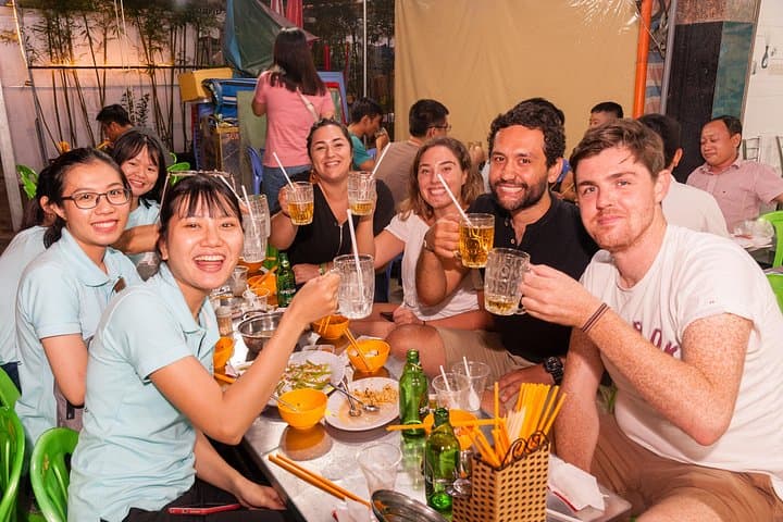 Saigon After Dark: Scooter Street-Food Tour with a Local Student
