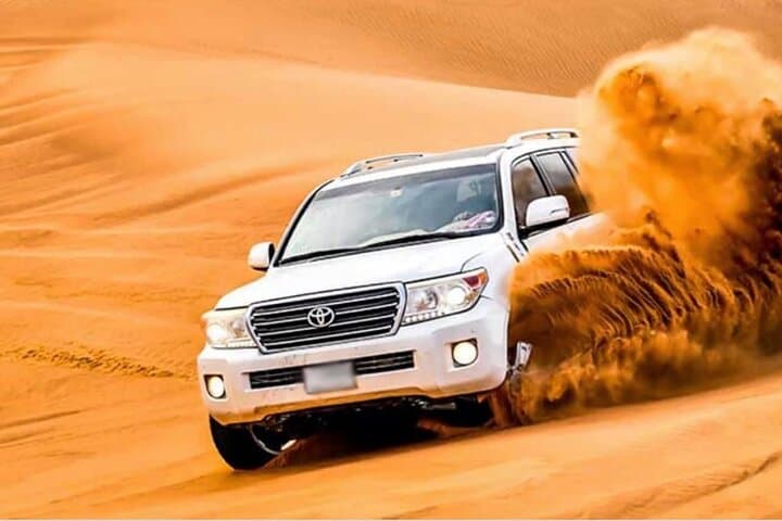Morning Lahbab Desert Safari from Dubai — Dune Bashing, Camel Ride & Sandboarding