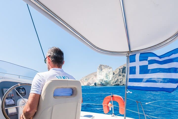 Santorini Private Half-Day Catamaran Cruise — Red Beach, Hot Springs & Caldera Views photo 4