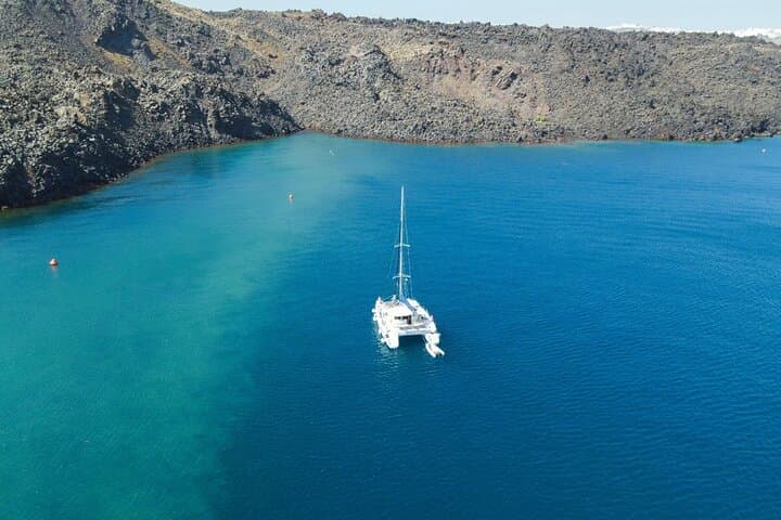 Santorini Private Half-Day Catamaran Cruise — Red Beach, Hot Springs & Caldera Views photo 6