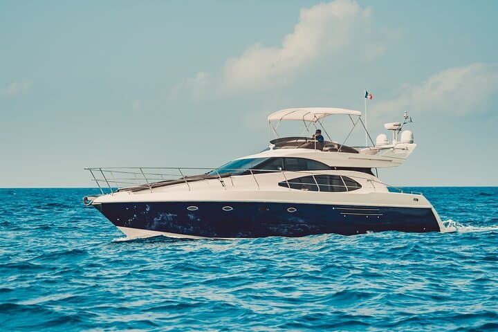 Private 8-Hour Azimut Yacht Tour to Cozumel: Playa Palancar, El Cielo & Snorkeling photo 2
