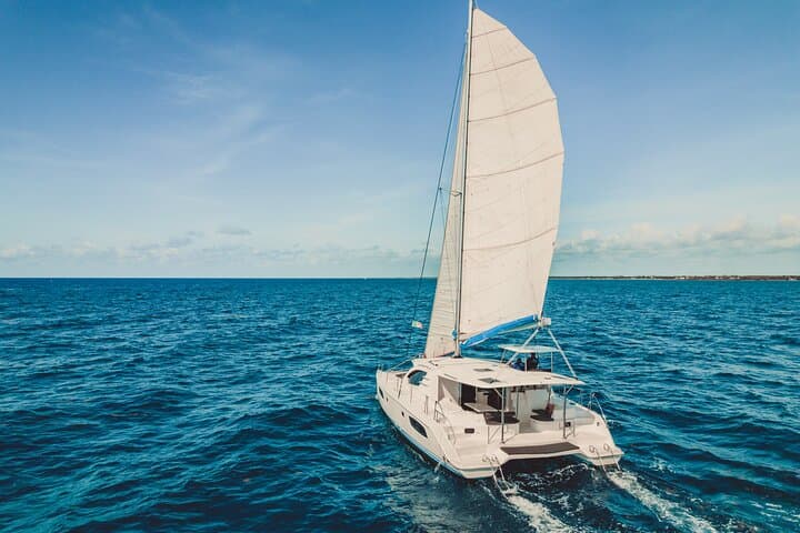 Private 5-Hour Catamaran Snorkel Tour from Playa del Carmen with Open Bar & Fishing