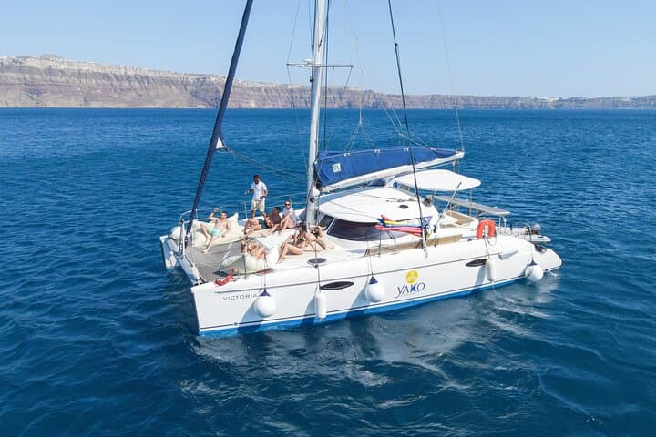 Full-Day Private Santorini Catamaran Cruise: Red Beach, Hot Springs & Sunset Dinner photo 4