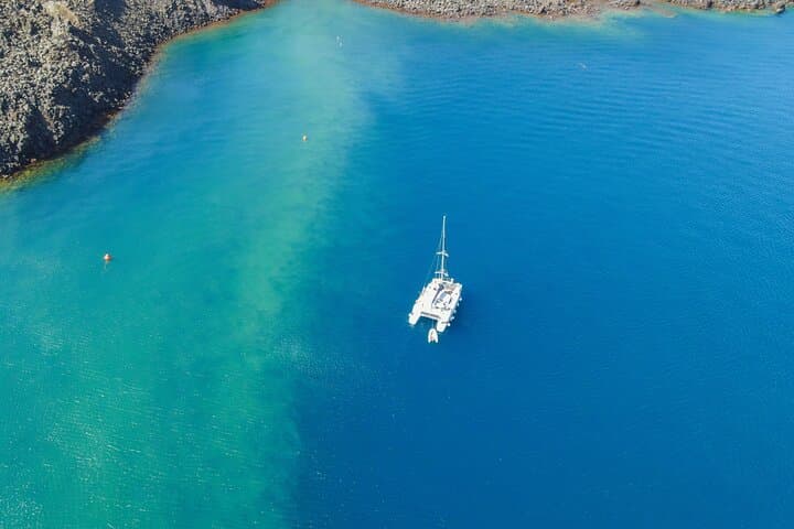 Full-Day Private Santorini Catamaran Cruise: Red Beach, Hot Springs & Sunset Dinner photo 5