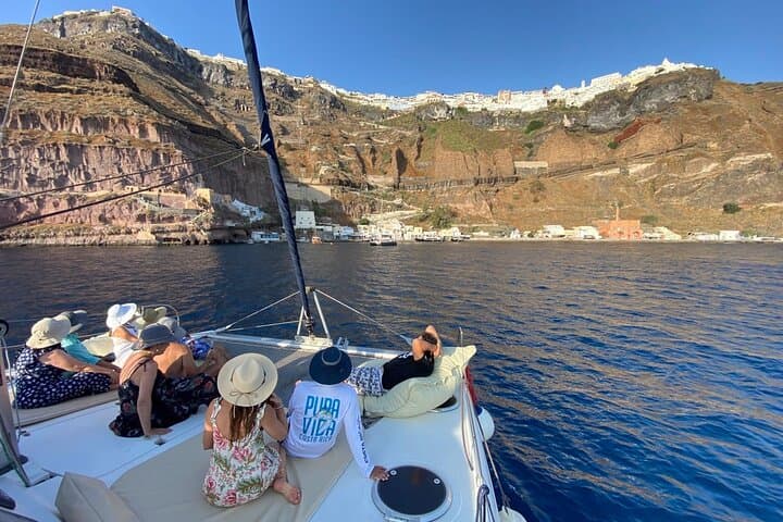 Full-Day Private Santorini Catamaran Cruise: Red Beach, Hot Springs & Sunset Dinner