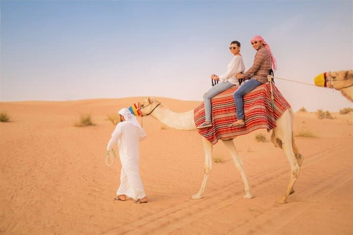 Morning Dubai Desert Safari: Sandboarding, Dune Bashing & Camel Ride