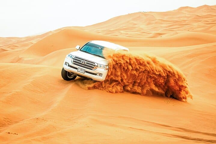 Morning Dubai Desert Safari: Sandboarding, Dune Bashing & Camel Ride photo 4