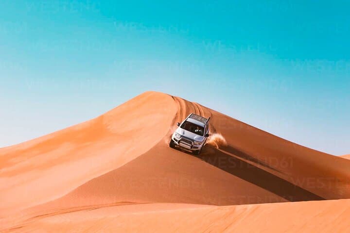 Morning Dubai Desert Safari: Sandboarding, Dune Bashing & Camel Ride photo 5