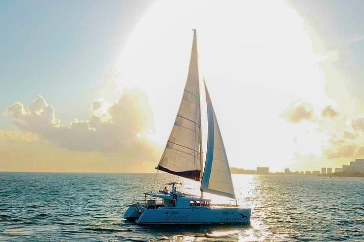 Catamaran to Isla Mujeres with Open Bar — Snorkel, Beach Club & Sunset Party