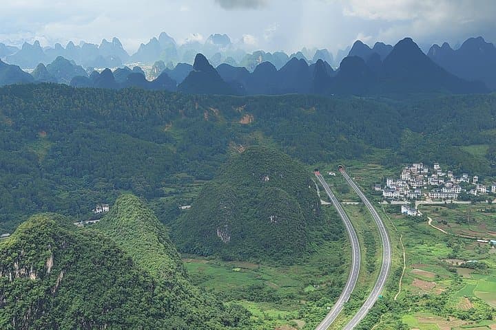 Yangshuo Yulong Bamboo Raft and Ruyi Peak Cable Car: One-Day Scenic Tour from Xingping photo 1