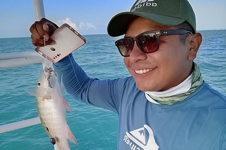 Private Fishing Tour in Holbox Island: Catch, Cook, and Learn with Local Captains photo 2
