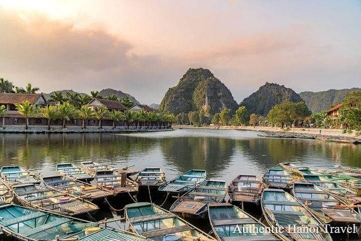 Tam Coc & Hoa Lu Day Tour: Biking, Bamboo Boat and Cave Exploration from Hanoi photo 3