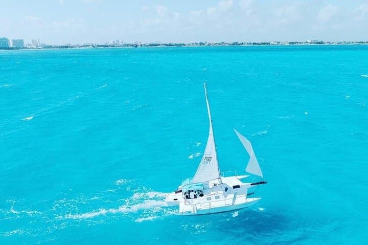 Private Catamaran to Isla Mujeres: Snorkel Reefs, Beach Club Lunch & Open Bar from Cancun photo 2