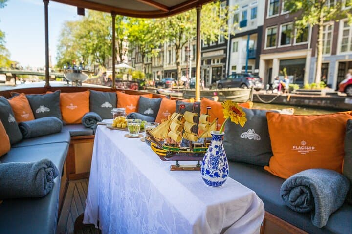 Classic Amsterdam Canal Cruise in 100-Year-Old Salon Boat with Drinks and Cheese photo 2