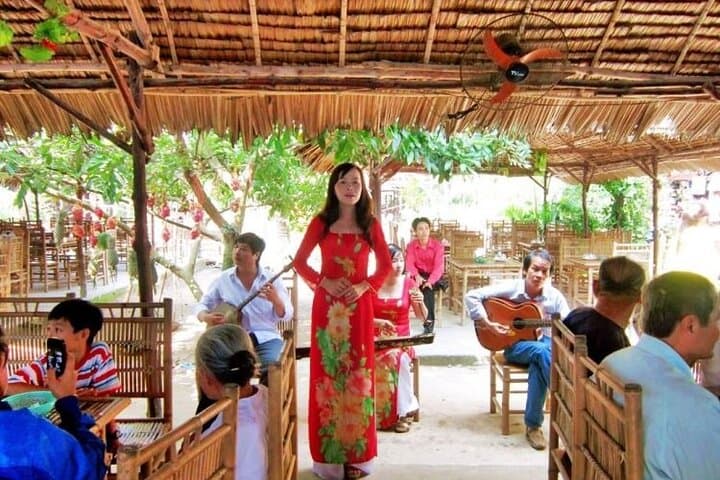 Mekong Delta Day Tour — My Tho Boat Cruise, Coconut Island & Vinh Trang Pagoda photo 6