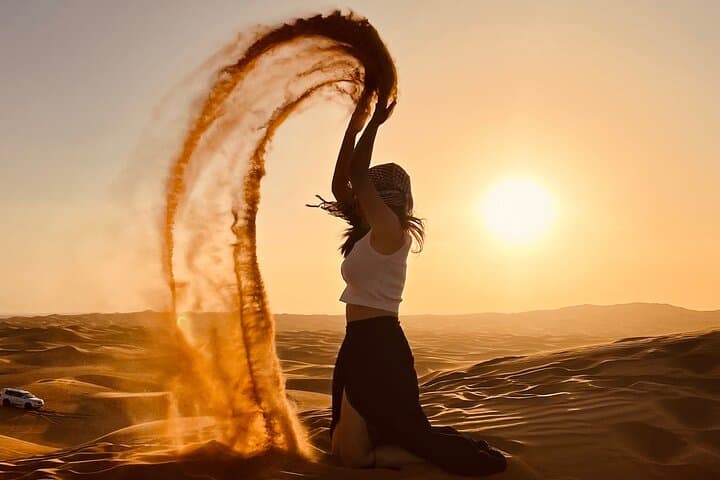 Private Dubai Desert Safari with Dune Bashing, Camel Ride & BBQ Dinner