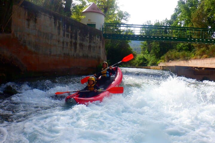 Cano-Rafting in Montanejos: Self-Paddle Class III River Adventure in Valencia photo 2