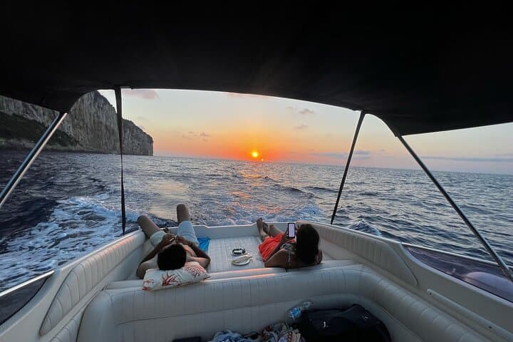 Capri Sunset Gozzo Cruise: Aperitif, Caves & Faraglioni Evening Tour photo 4