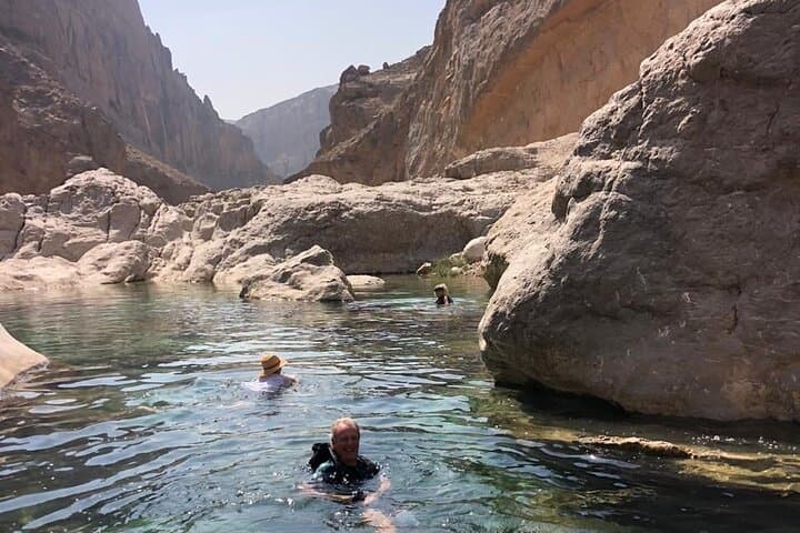 Wadi Shab Tour from Muscat: Bimmah Sinkhole, Fins Beach & Canyon Swim photo 2