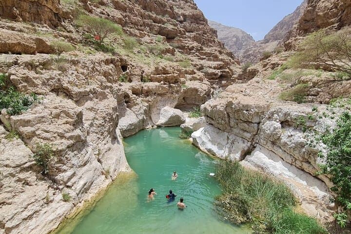 Wadi Shab Tour from Muscat: Bimmah Sinkhole, Fins Beach & Canyon Swim photo 3