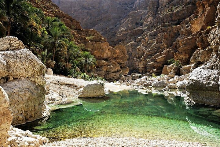 Wadi Shab Tour from Muscat: Bimmah Sinkhole, Fins Beach & Canyon Swim photo 6