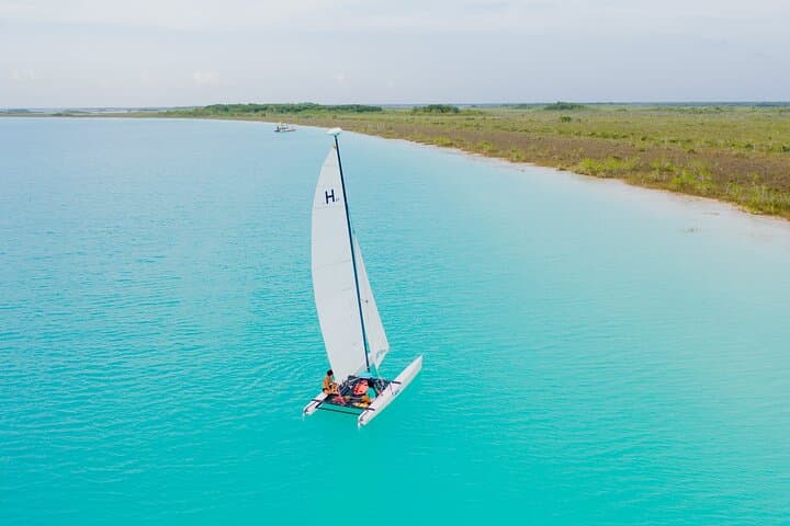 Private Catamaran Sailing Through Bacalar's Mangroves and Cenotes photo 4