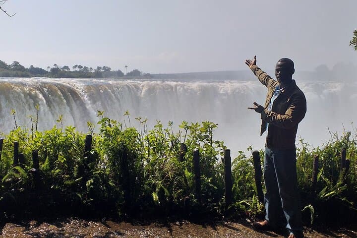 Full-Day Victoria Falls Safari Tour: Guided Falls, Bridge Walk, Game Drive & Boma Dinner photo 1