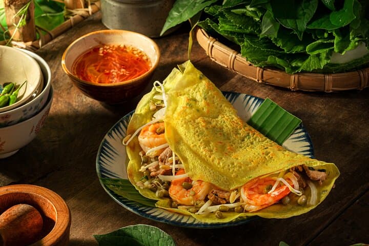 Saigon Night Motorbike Food Tour — Eats After Dark, Street Eats & Rooftop Views photo 3