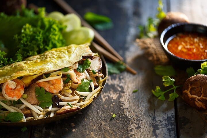 Saigon Night Motorbike Food Tour — Eats After Dark, Street Eats & Rooftop Views photo 5