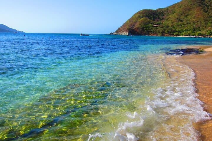 Tayrona’s Seven Waves to Playa Cristal: A Day Hike, Boat Ride and Snorkel in Colombia