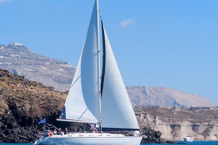 Santorini Private Day Sailing Cruise with Meal, Hot Springs & Caldera Swim photo 1