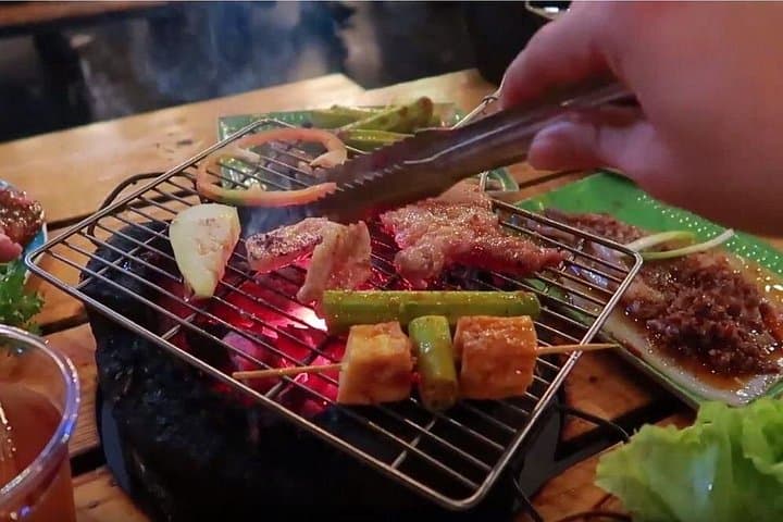 Saigon Night Street Food Tour: Motorbike Eats & Local Flavors photo 4