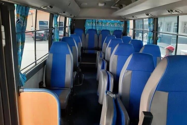 Shared Shuttle San Ignacio to Flores: Air-Conditioned Cross-Border Transfer photo 4