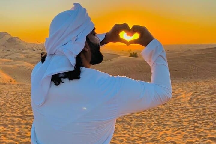 Afternoon Desert Safari in Al Madam: Quad Biking, Camel Ride & Sandboarding photo 2