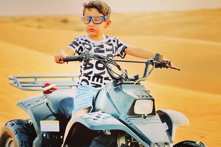 Afternoon Desert Safari in Al Madam: Quad Biking, Camel Ride & Sandboarding photo 4