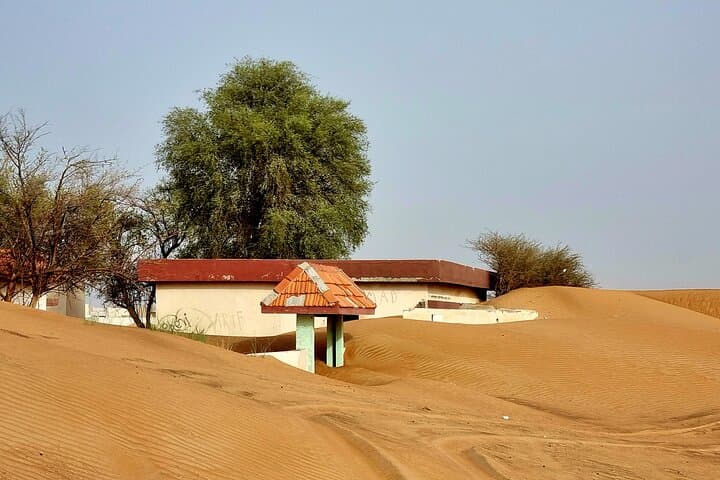 Al Madam Ghost Village Desert Safari: Dune Bashing & Sandboarding from Dubai photo 3