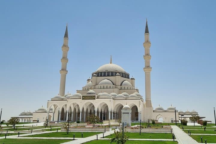 Sharjah Cultural Desert Safari — Dune Bashing, Sandboarding & Traditional BBQ photo 1
