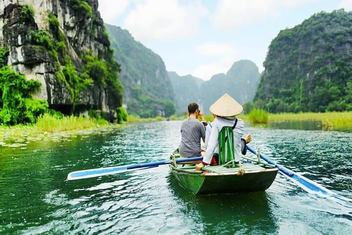 Tam Coc & Hoa Lu Day Trip: Cycling the Rice Fields, Boat Caves & Local Buffet from Hanoi photo 1