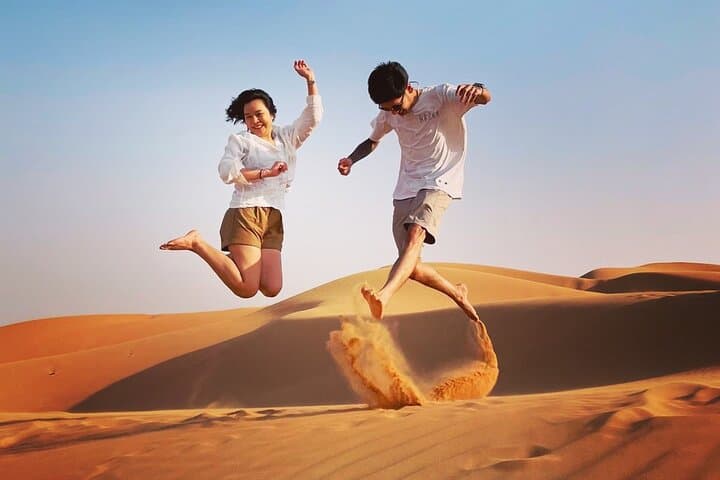 Private Desert Safari in Al Madam — Camel Ride, Dune Bashing & Bedouin BBQ photo 2