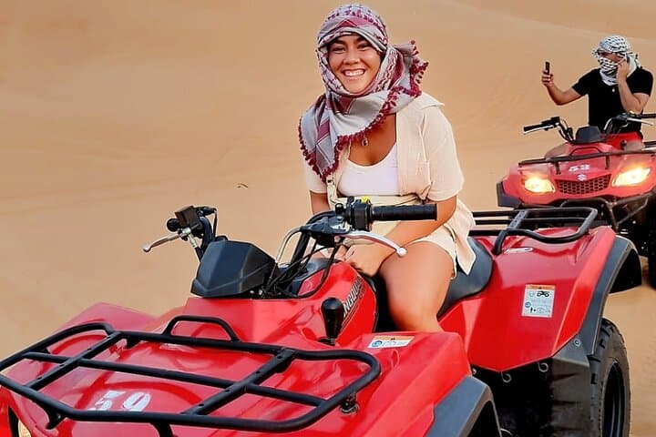 Red Dunes Quad Bike Safari & Sandboarding — Al Madam Desert Adventure