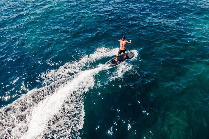 Full-Day Radinn Electric Surfboard Rental in Mallorca: Ride Quiet Power photo 2