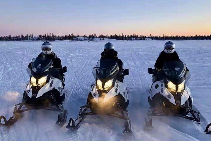 Explore Yellowknife’s Winter Trails on a Thrilling Snowmobile Tour photo 2