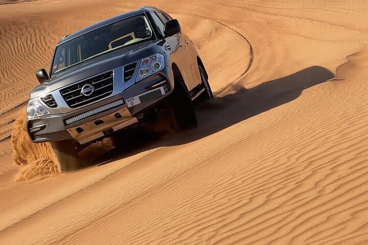Private Desert Safari in Al Madam — Camel Ride, Dune Bashing & Bedouin BBQ