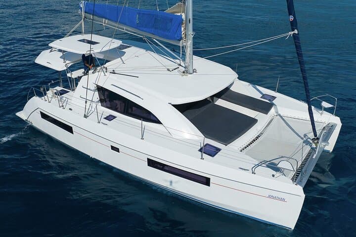 Private 8-Hour Catamaran to Playa Palancar: Snorkel, Fish & Beach Lunch