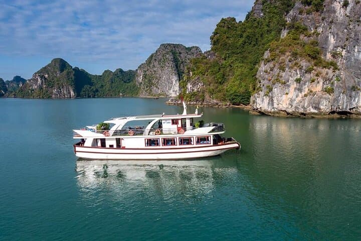 Halong Bay Full-Day Luxury Cruise — Surprise Cave, Titop & Floating Villages photo 3