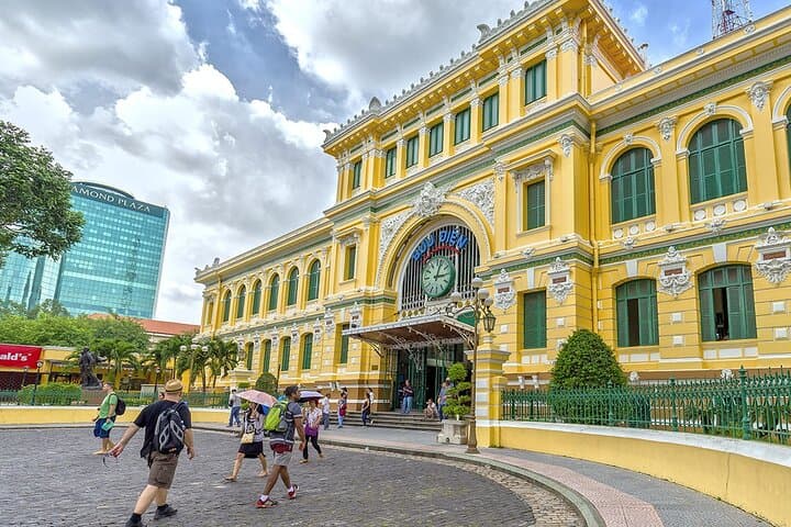Insiders Saigon Vespa Tour: Half-Day Markets, Monuments & Hidden Streets photo 3