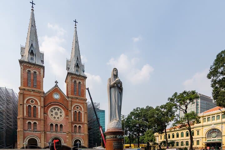 Insiders Saigon Vespa Tour: Half-Day Markets, Monuments & Hidden Streets photo 5